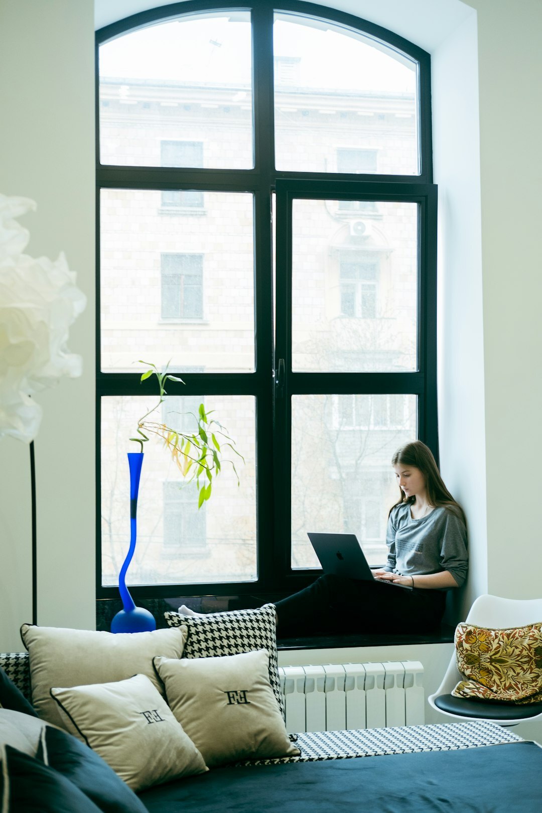 Woman working on laptop at home