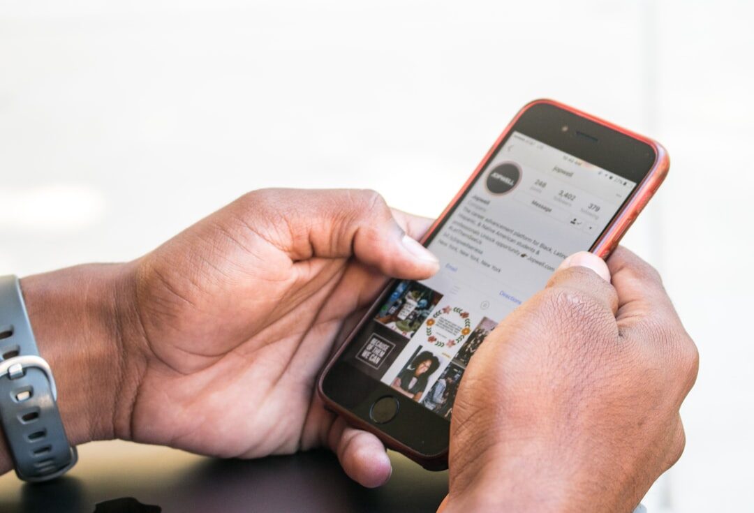 Person reading news on a smartphone